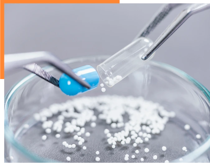 Pharmaceutical Worker Examining a Pill