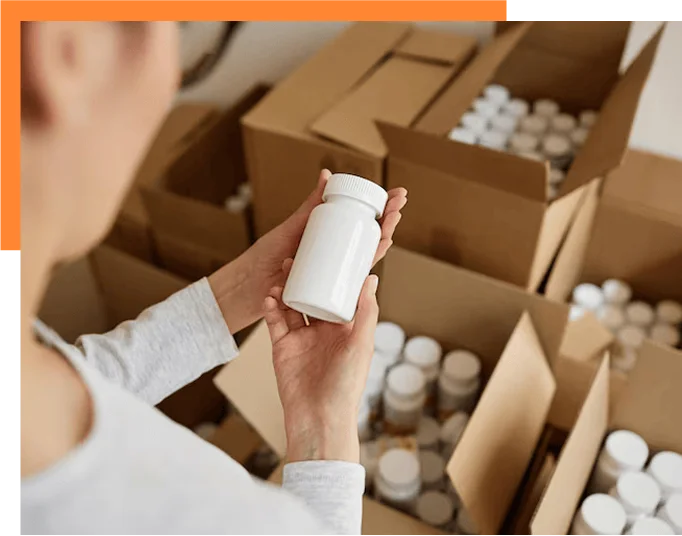 top view young woman holding blank pill bottle packaging medicine factory