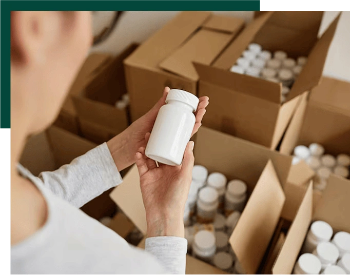 top view young woman holding blank pill bottle packaging medicine factory